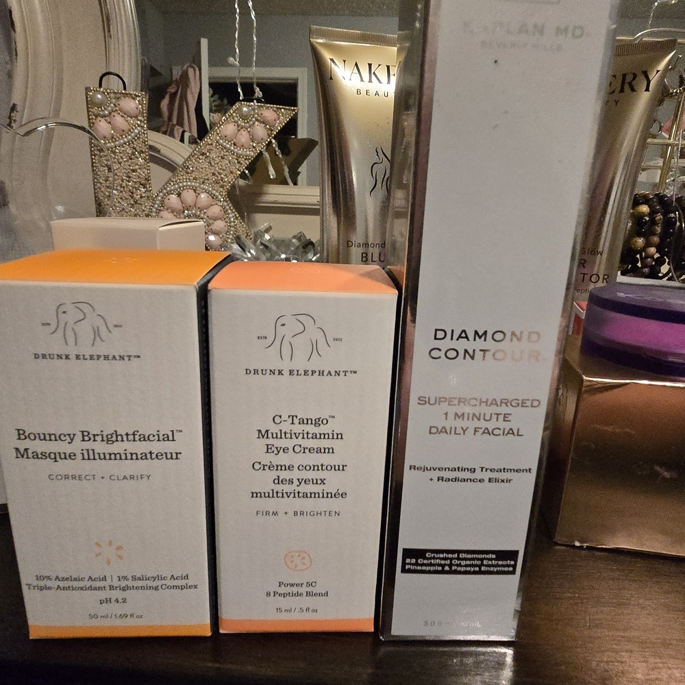 Drunk Elephant Skincare Set - Orange and White